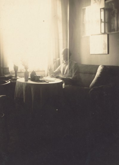 Oskar Schlemmer Seated at Table with Coffee Service by Oskar Schlemmer