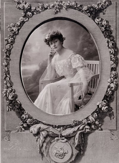 Portrait of a Lady Sitting on an Oval Bench in a Background Decorated with Flowers by Paul Nadar