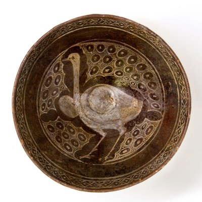 A 10th century Persian ceramic bowl depicting an ostrich by Persian School