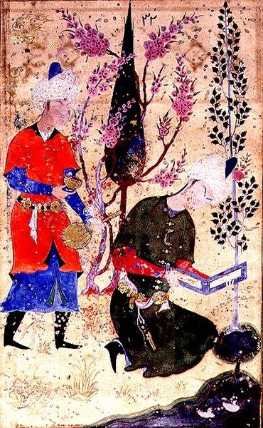 A seated prince reading whilst a servant serves wine, from the Tohfat Al-Ahrar, Bokhara School by Persian School