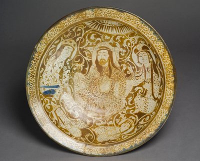 Stone-paste dish decorated in golden lustre, from Kashan, Iran, early 13th century by Persian School
