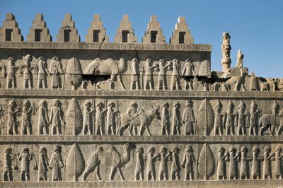 The palace of Darius I, in Persepolis (Iran): detail of the decor of the apadana or courtroom, representing the submissive peoples bringing presents to Darius I (550-486 BC, said The Great). Low relief, 6th BC, Persian art, period route. by Persian School