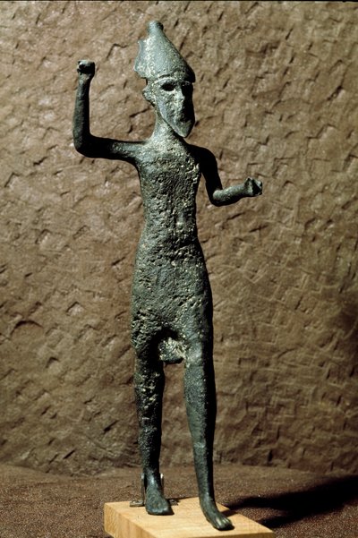 Phoenicia: figurine of a god in bronze. Found in the sea near Selinunte, Sicily. 14th-13th century BC by Phoenician