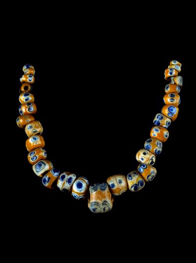 Phenician art: glass paste necklace. 4th-3rd century BC. Museo Archeologico di Villa Giulia, Rome by Phoenician