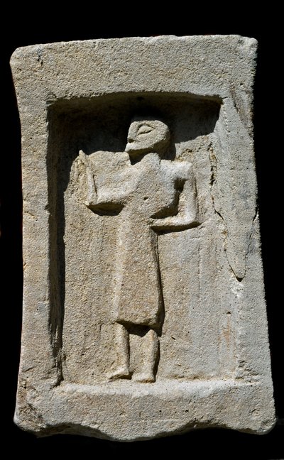 Punic Funerary Stele with Relief of Walking Character by Phoenician Phoenician