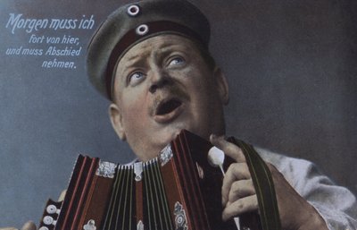 German Soldier Playing an Accordion by Photographer German