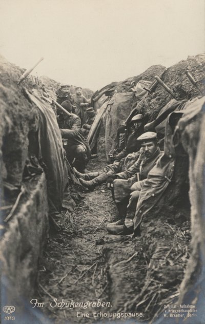 German soldiers taking a break in the trenches, World War I by Photographer German