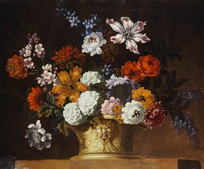 Tulips, snowballs and other flowers in a sculpted urn on a ledge by Pieter Casteels