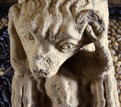 Lion eating a man, base of sarcophagus of D. Afonso Pires, former Bishop of Porto, Lamego, Portugal c.1372 by Portuguese School