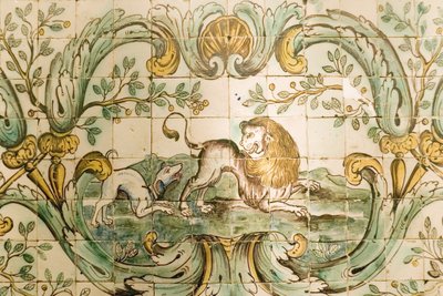 Majolica depicting tiles of a dog chasing a lion, from The Hunting Room at Palacio da Praia, Belem, c.1680 by Portuguese School