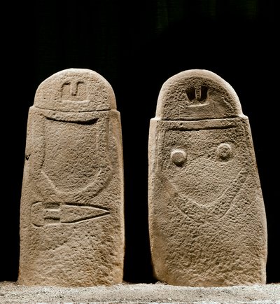 Two menhirs of man and woman dating from the Iron Age from the site of Lunigiana near La Spezia, Italy. 1100-800 BC. La Spezia, Museo Comunale della Civilta Lunigiana by Prehistoric Prehistoric