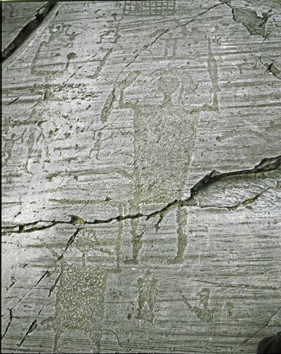Prehistory, Camunni civilization, rock art: grave rock of stylized representations of warriors, (detail) depicting the Great Warrior armed with a sword and a shield. Period between the Neolithic and the Bronze Age. Roche n. 50. Naquane (Brescia) by Prehistoric Prehistoric