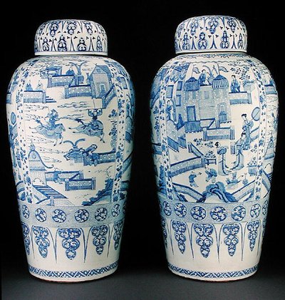 A pair of blue and white soldier vases by Qing Dynasty Chinese School