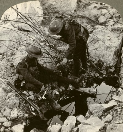 Giving water to a wounded pal, Hooge, Ypres, Belgium, World War I, 1914-1918 by Realistic Travels Publishers