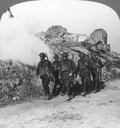 Troops passing the ruins of Monchy on the way up the line, France, World War I, c. 1914-c. 1918 by Realistic Travels Publishers