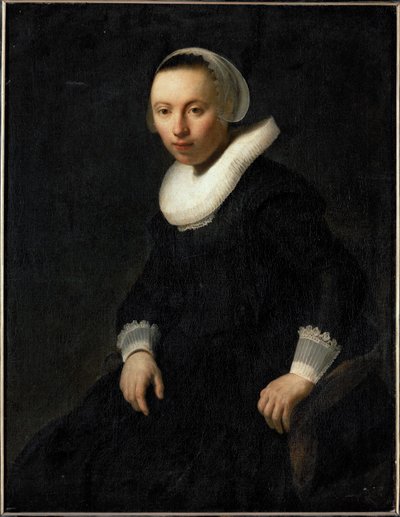 Young Woman Sitting in a Chair by Rembrandt Harmensz. van Rijn