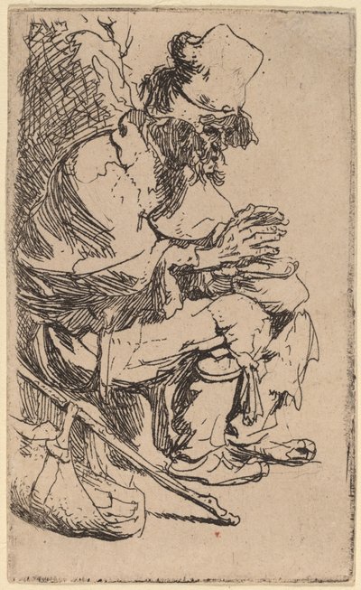 Beggar Seated Warming His Hands at a Chafing Dish by Rembrandt van Rijn