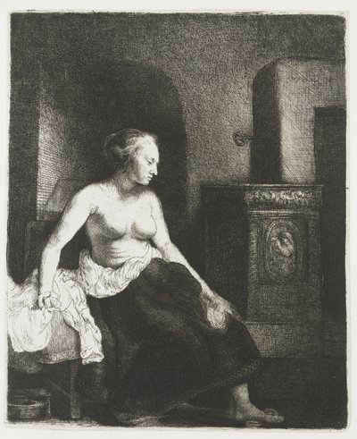 Woman Sitting Half Dressed Beside a Stove by Rembrandt van Rijn