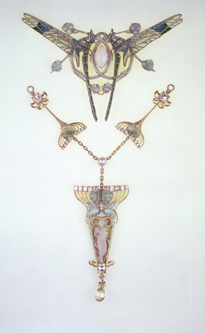 Hair ornament by Lalique and pendant by Philippe Wolfers by Rene Jules Lalique