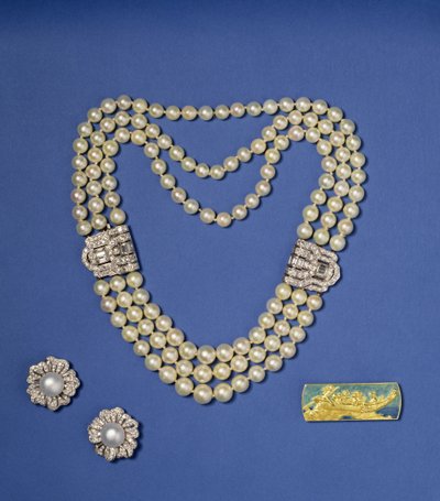 Selection of pearl jewellery: three-row pearl necklace with diamond clips; bouton shaped Southsea cultured pearl earrings; gold and enamel brooch by Lalique, c.1900 by Rene Jules Lalique