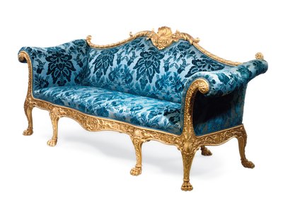 A George III giltwood sofa by Robert Adam