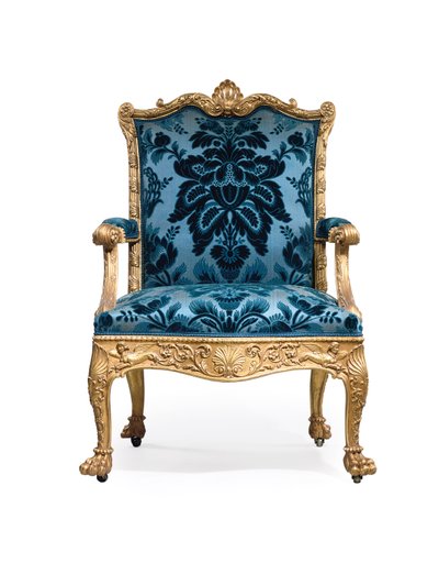 One of a pair of George III giltwood armchairs by Robert Adam