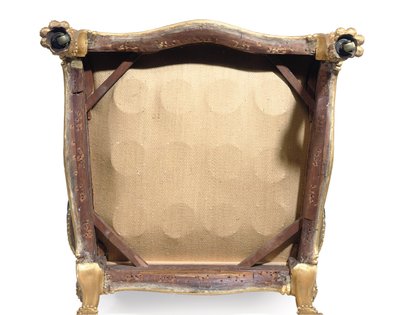 One of a pair of George III giltwood armchairs by Robert Adam