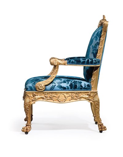 One of a pair of George III giltwood armchairs by Robert Adam