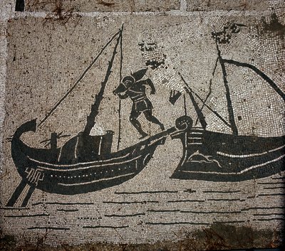 Ancient Ostia. Place des Corporations. Mosaic of the Sabratha Seafarers Corporation. Loading goods on a vessel by Roman