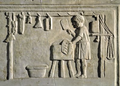A butcher in his shop by Roman