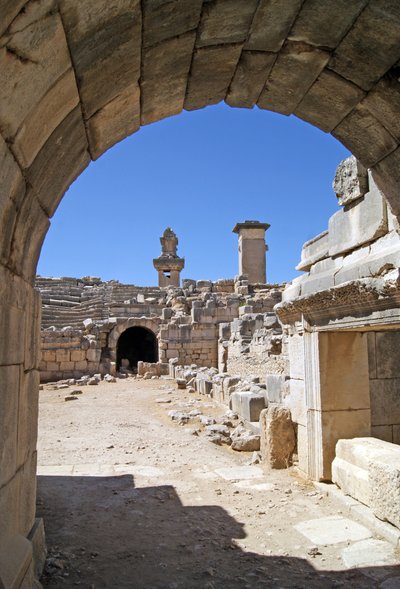 View Through the Vaulted Entrance of the Xanthos Theatre into the Orchestra Pit, Showing Pillar and Harpy Tomb, Xanthos, Turkey by Roman
