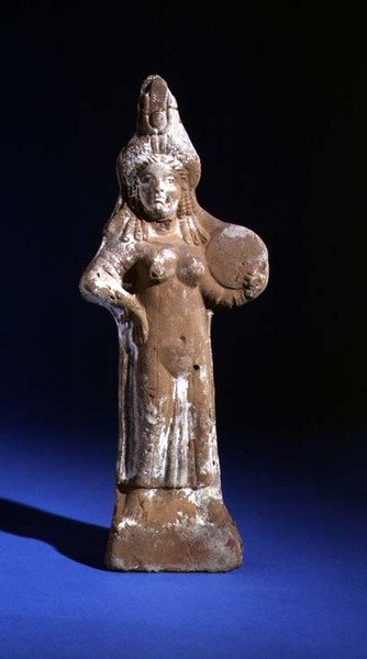 Statuette of the goddess Isis holding a tympanon by Roman Period Egyptian