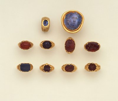 A Roman Gold and Chalcedony Intaglio Ring, a Large Roman Blue-Grey Chalcedony Medusa Head Cameo and a Selection of Rings, Two Rings in the Seljuk Style by Roman Roman