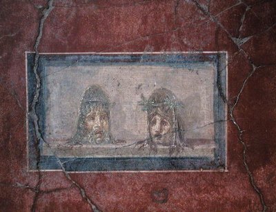 Two theatrical masks by Roman Roman