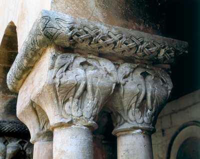 Romanesque art: capitals of the cloister decorated with birds by Romanesque