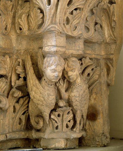 Top decorates sirens and birds on the model of those of the Church Saint Loup de Naud by Romanesque