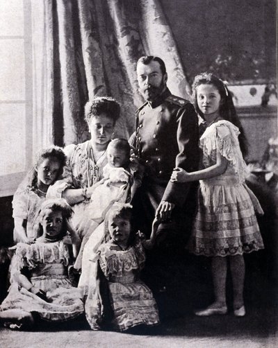The family of Tsar Nicholas II (1868 - 1918). From left to right: Grand Duchess Tatiana born 11 June 1897; Grand Duchess Mary born 27 June 1899; Grand Duchess Alexis born 12 August 1904; Empress Alexandra Feodorovna; Tsar Nicholas II; Grand Duchess Olga by Russian Photographer