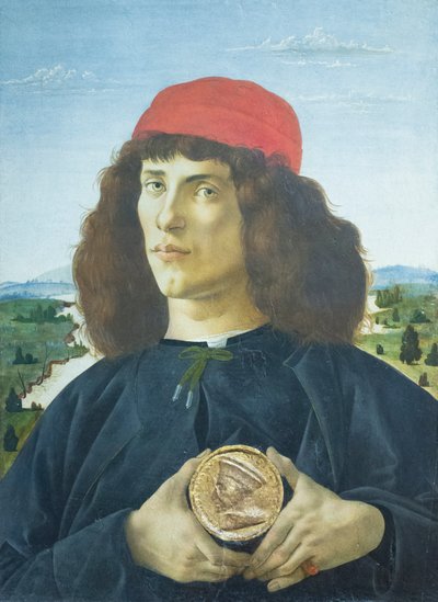 Portrait of a young man holding a medallion of Cosimo de