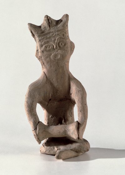 Cross-legged figure with an object thought to be a drum, from Susa, Iran, 4th-6th century AD by Sasanian School