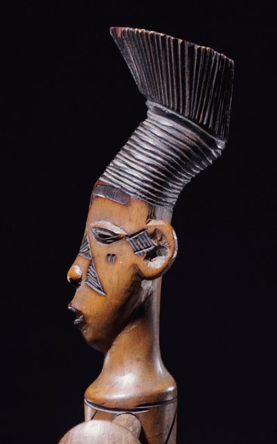 (detail) of a fine Magbetu harp depicting the head finial in profile by School African