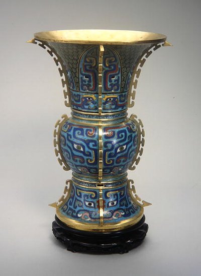 A Zun Shaped Vase and Stand by School Chinese