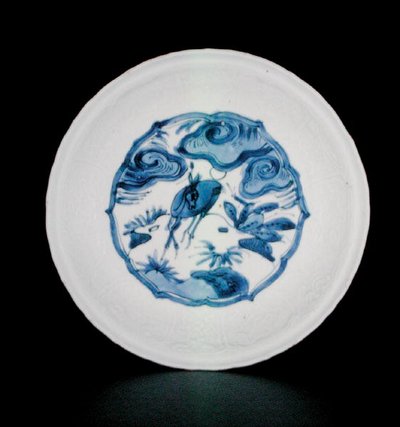 Blue and white kraak saucer dish painted with deer in a landscape, Wanli by School Chinese