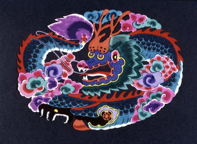 Chinese paper cut and colored with a dragon by School Chinese