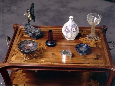 Loetz iridescent glass vase, a pate-de-verre bow by Argy Rousseau and a glass with moulded and etched decoration by Lalique by School French