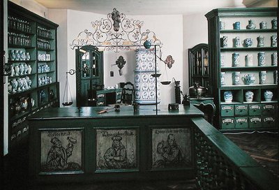 Reconstruction of a pharmacy with 18th century furniture and objects from the 12th-18th century by School German