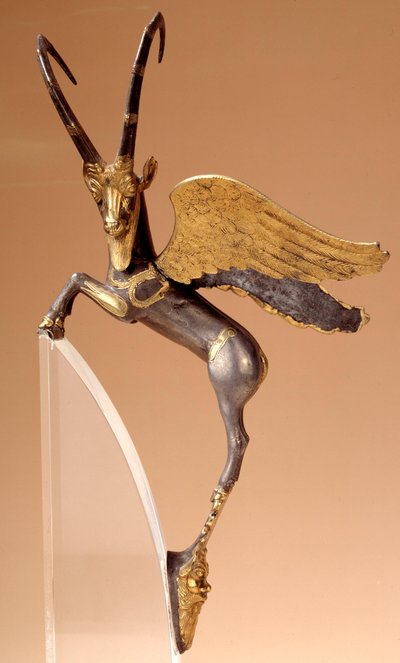 Ceremonial handle: winged ibex in silver, inlaid, gold. Achaemenid Persian period (6th-4th century BC), from Iran. Louvre by School Persian