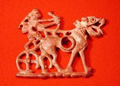 Horse bit depicting a hunter on his chariot, firing his bow, c.1200-700 BC by School Persian