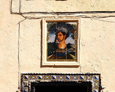 Ceramic tiles with the portrait of a man outside the House of the Moorish King by School Spanish