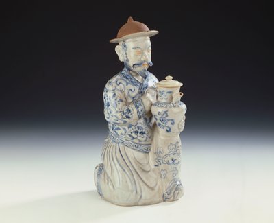 An unrecorded Annamese blue and white ewer formed as a kneeling attendant by School Vietnamese