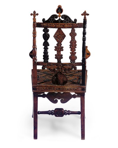 Inlaid and carved open armchair encoded with a patchwork of various phrases, early 19th century by Scottish School